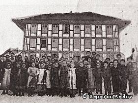 Postkarte mit Häusern von Uettligen, 1910